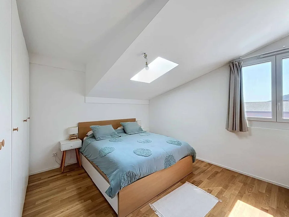 Attic apartment with 4.5 rooms between light and serenity