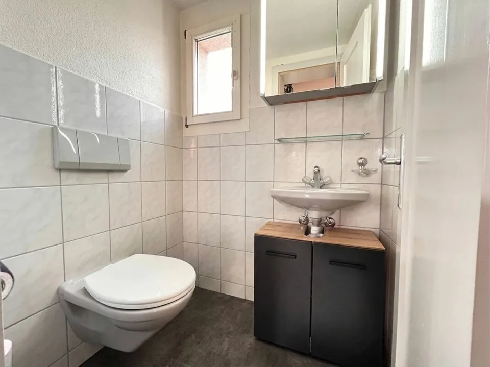 Casa a schiera su pendio soleggiato con garage