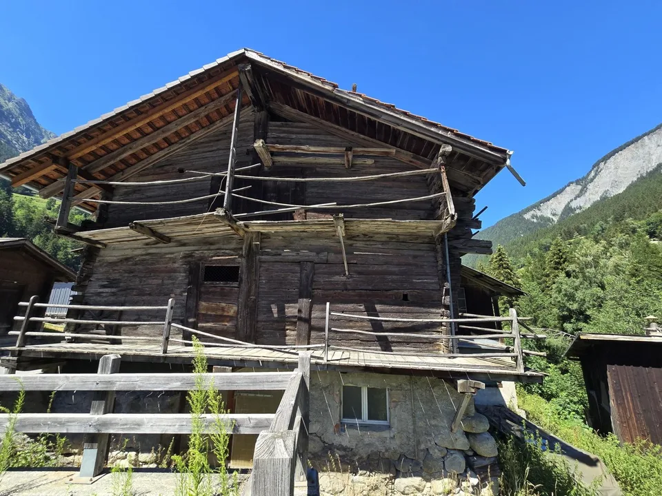 A Place of Life and Opportunities in the Heart of Val Ferret: Mixed-Use Building, Café-Restaurant and 3 Apartments, Barn and Garden