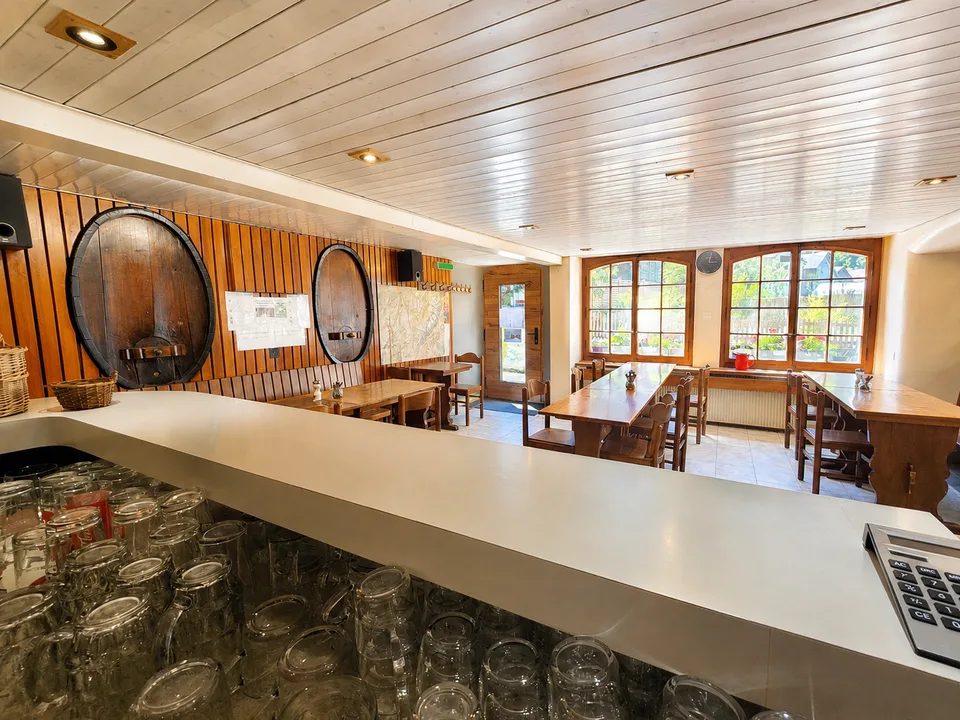 A Place of Life and Opportunities in the Heart of Val Ferret: Mixed-Use Building, Café-Restaurant and 3 Apartments, Barn and Garden