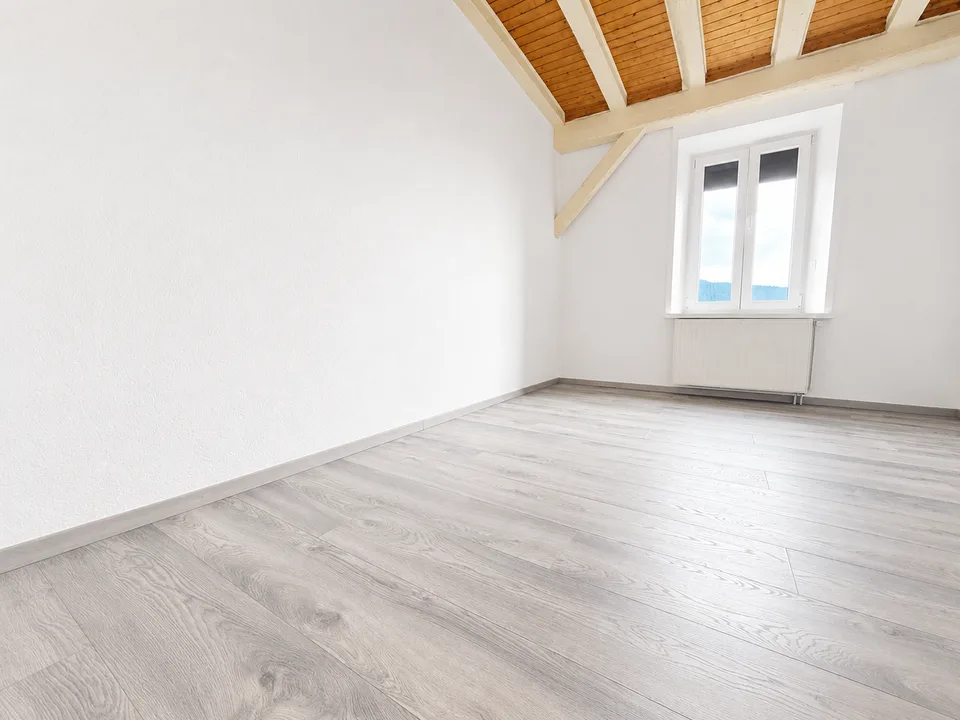 Auf der letzten Etage eines Herrenhauses mit Garten