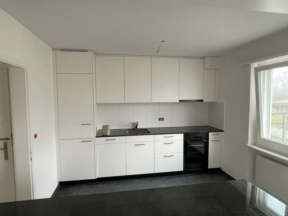 Modern, renovated 3.5-room apartment with balcony in Ins