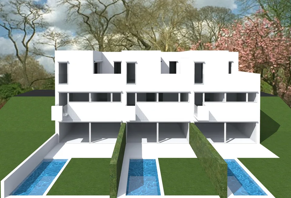 Moderna casa contigua con giardino a Villa Luganese