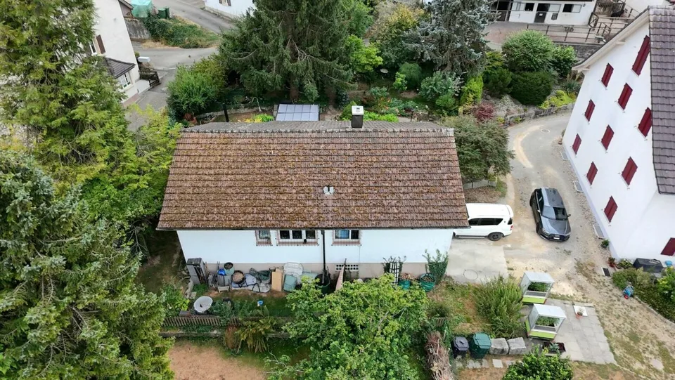 Ein Garten zum Verlieben! Freistehendes Einfamilienhaus mit viel Potenzial