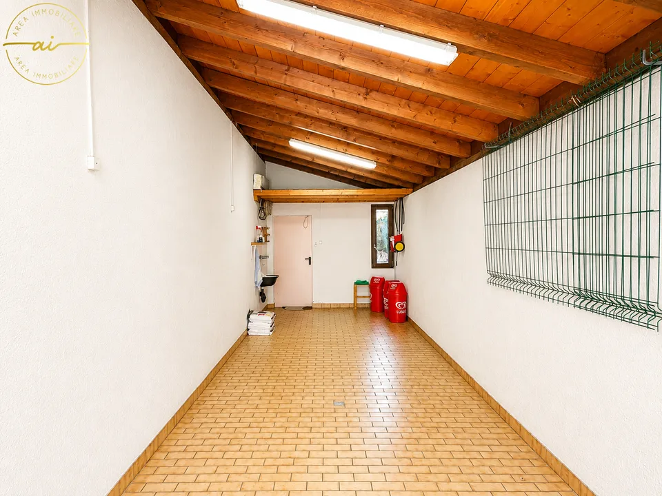 Spacious 5.5-room house with garden in green area in Stabio