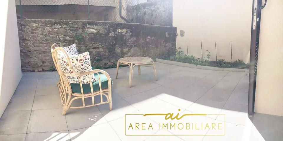 AMPIO E MODERNO 2.5 LOCALI CON CORTILE PRIVATO