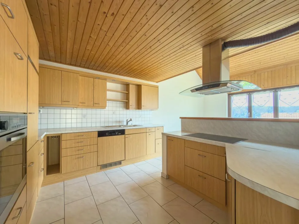 Maison mitoyenne charmante et spacieuse dans un emplacement bien entretenu