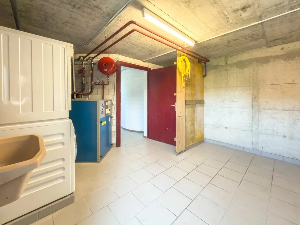 Maison mitoyenne charmante et spacieuse dans un emplacement bien entretenu