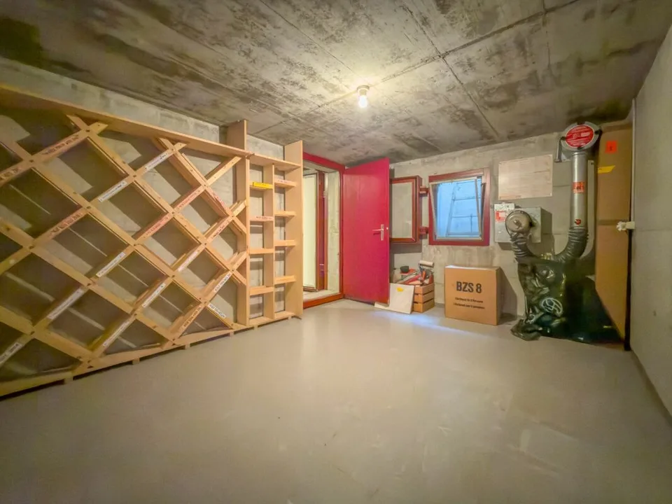 Maison mitoyenne charmante et spacieuse dans un emplacement bien entretenu