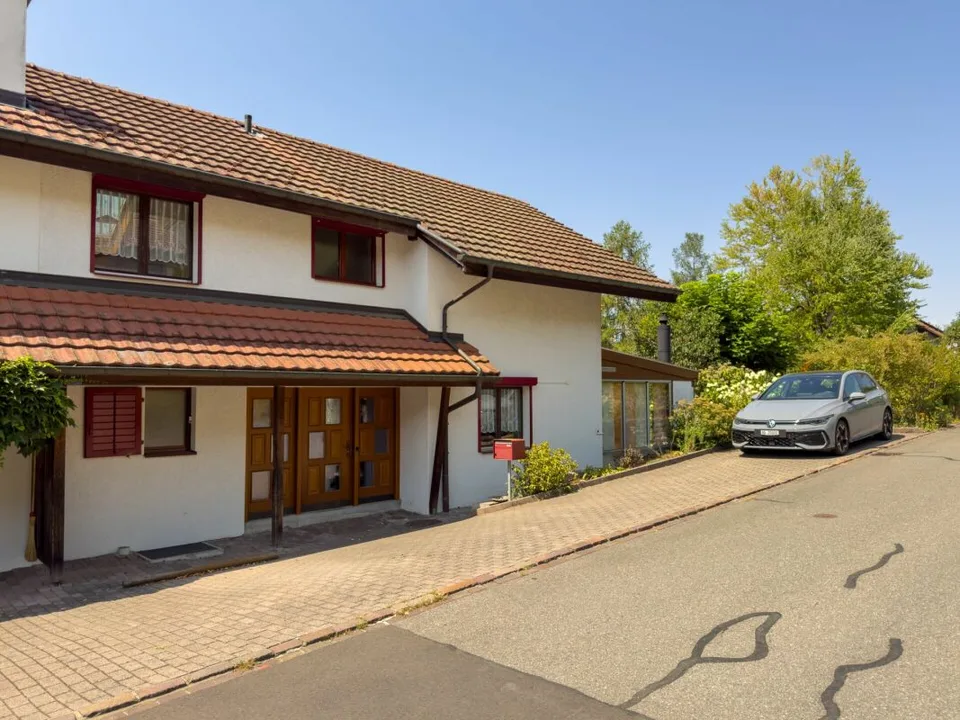 Maison mitoyenne charmante et spacieuse dans un emplacement bien entretenu