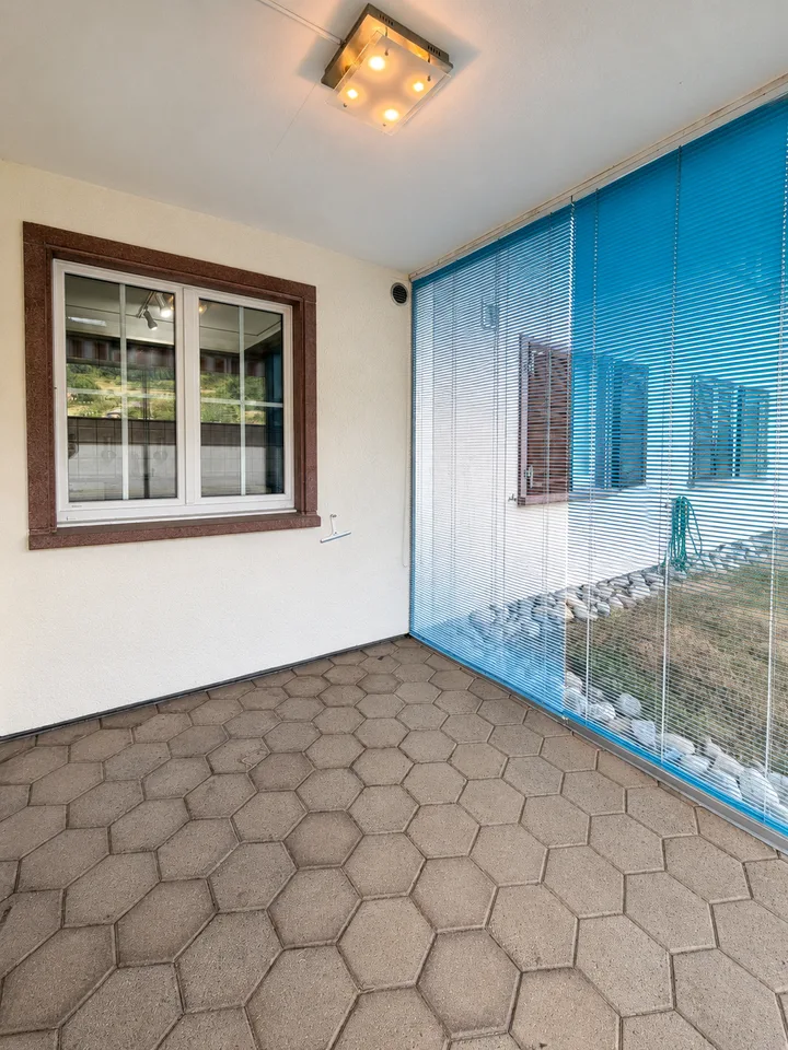 Charmante 2.5-Zimmerwohnung mit Wintergarten und Sitzplatz