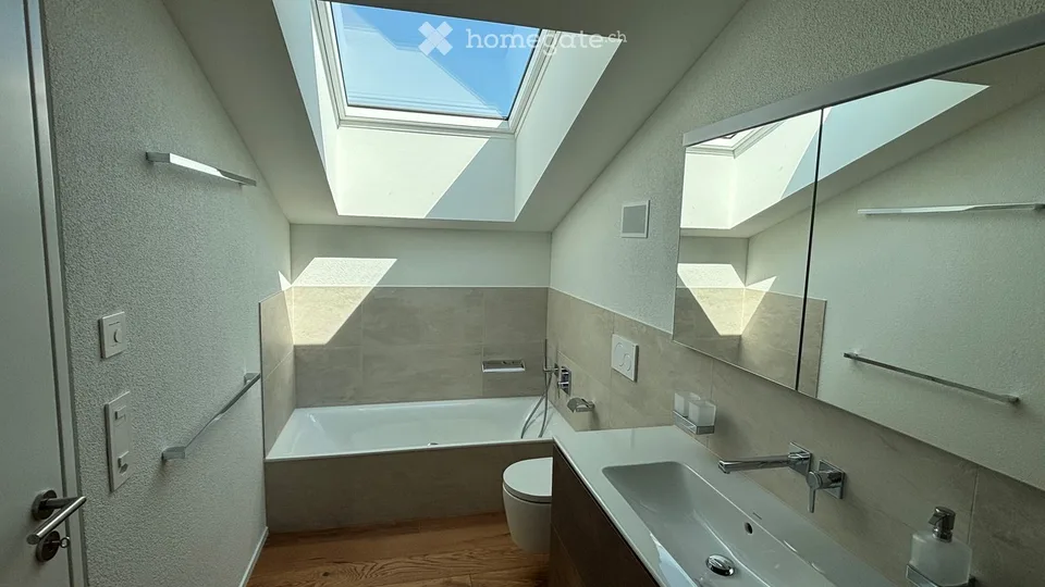 Moderne 3.5-Zimmer-Attikawohnung mit Bergblick im Dorfzentrum Buochs