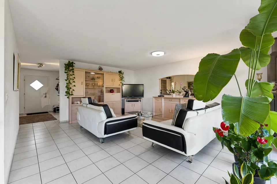 Maison unifamiliale de 6,5 pièces avec un jardin magnifiquement aménagé