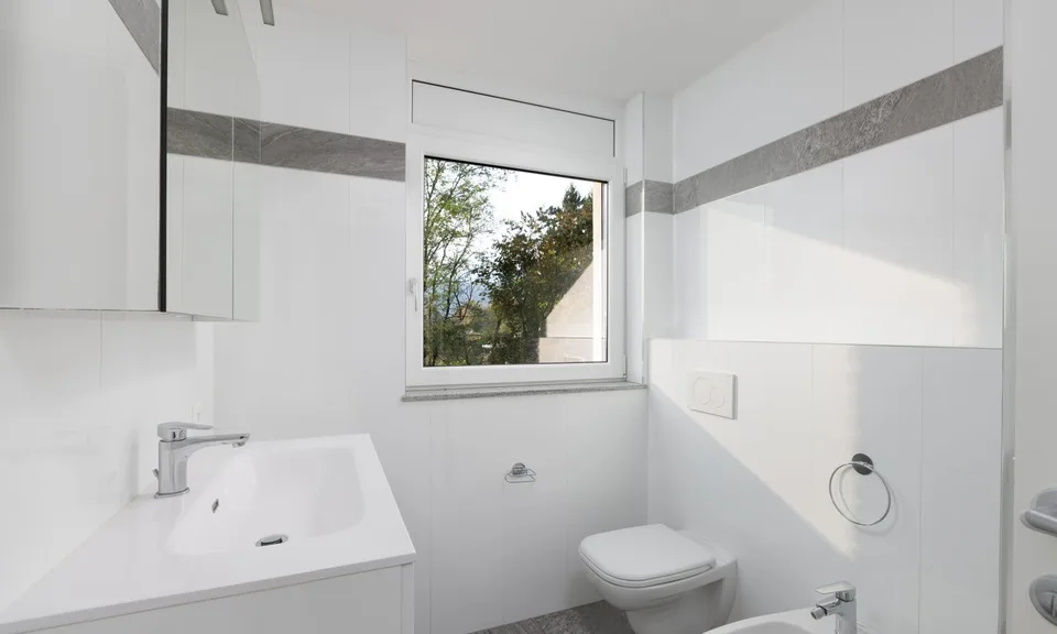 BRIGHT AND SPACIOUS 3.5 ROOMS INCOME IN LUGANO CADRO