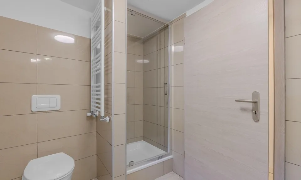 2.5-room unit in the core with garden in Sigirino