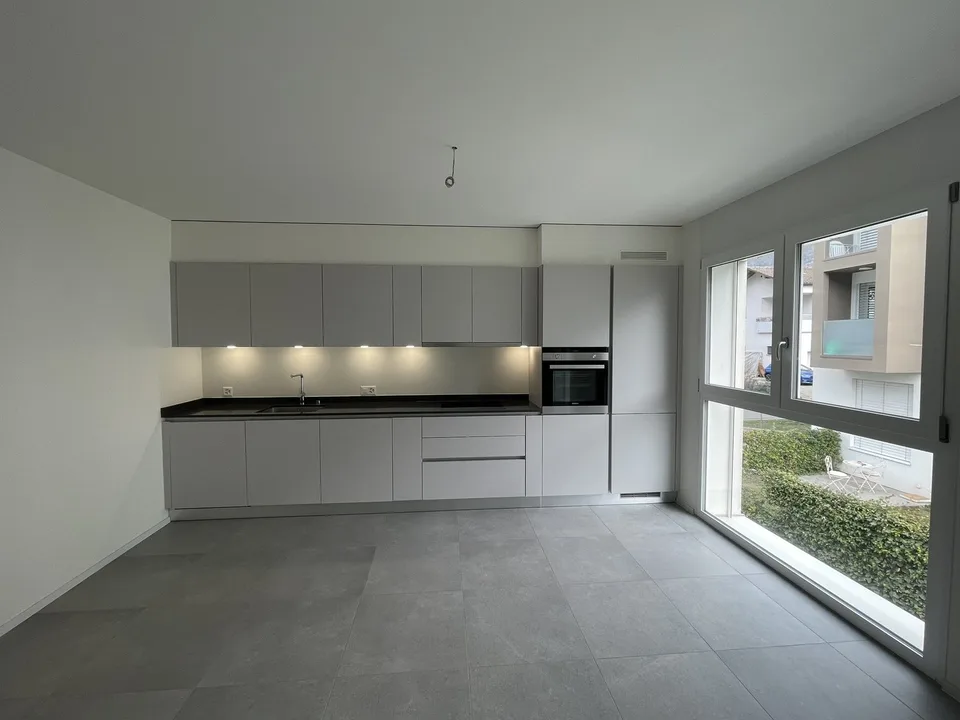 Appartement moderne et spacieux 2.5 pièces avec deux places de parking intérieures