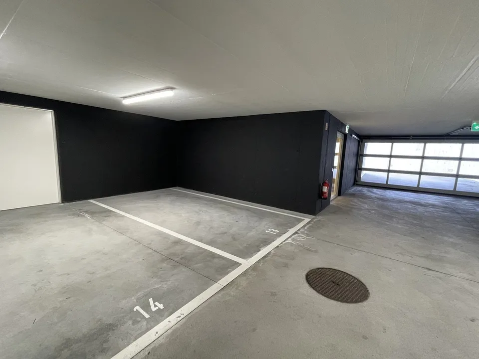 Appartement moderne et spacieux 2.5 pièces avec deux places de parking intérieures