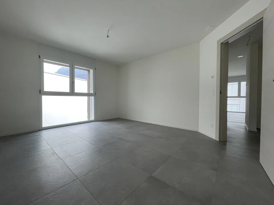 Appartement moderne et spacieux 2.5 pièces avec deux places de parking intérieures