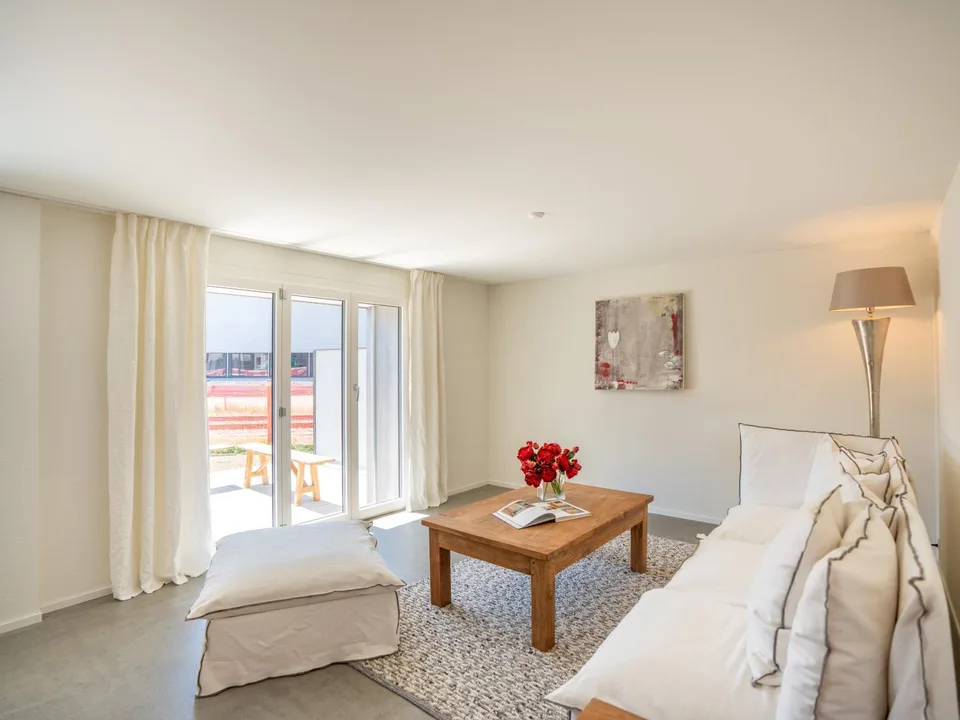 Moderne Wohnoase mit grosser Terrasse und eigenem Gartenanteil