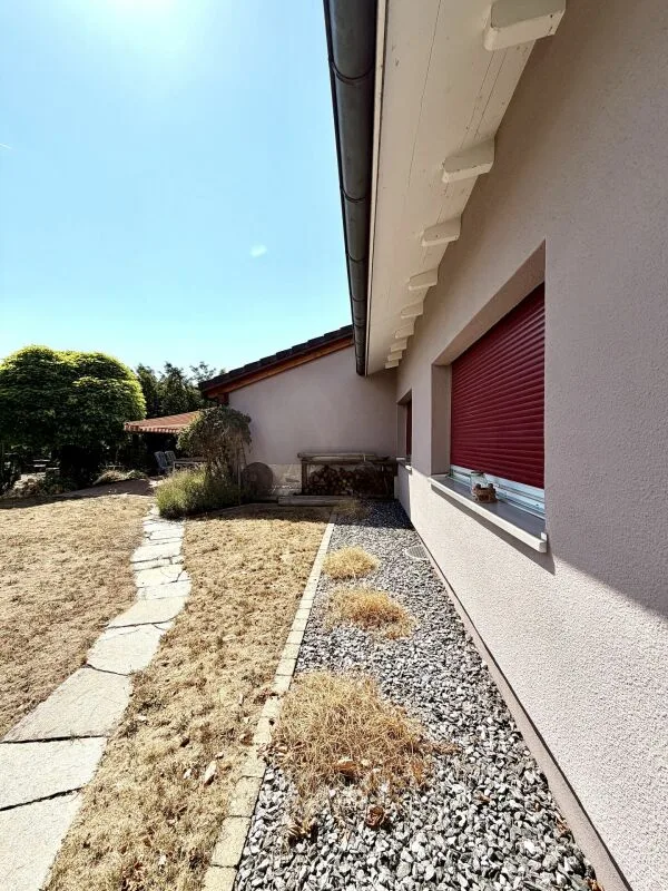 Casa unifamiliare attraente con giardino ben curato!