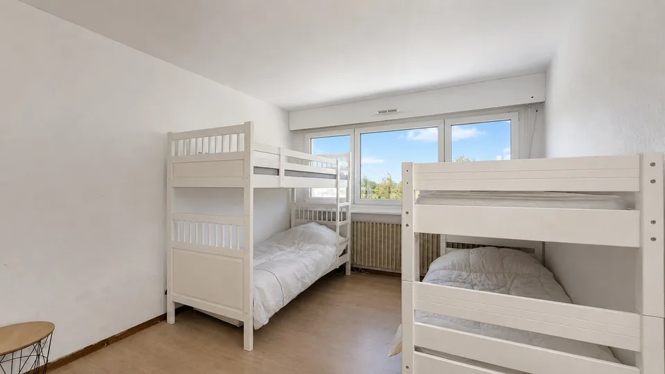 Ferney, T3 en attique 65,5 m² avec parking et cave