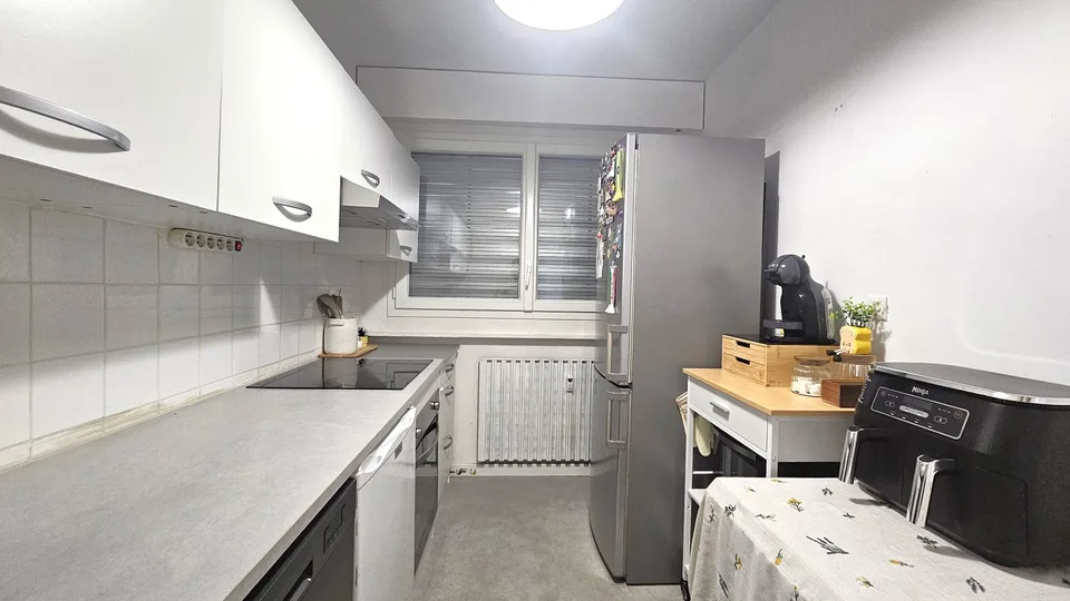 Ferney, T3 en attique 65,5 m² avec parking et cave