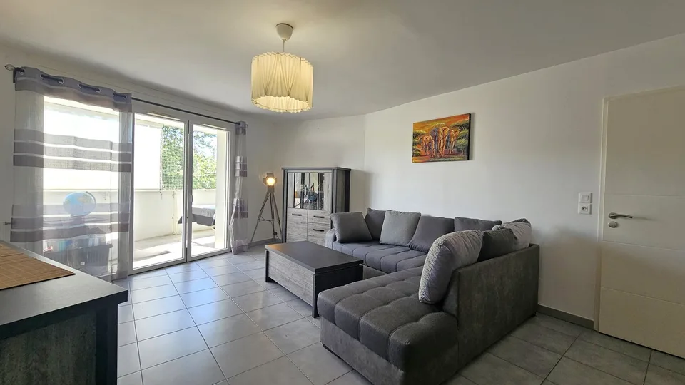 Saint-Genis-Pouilly centre   T3 de 71 m² avec balcon et garage