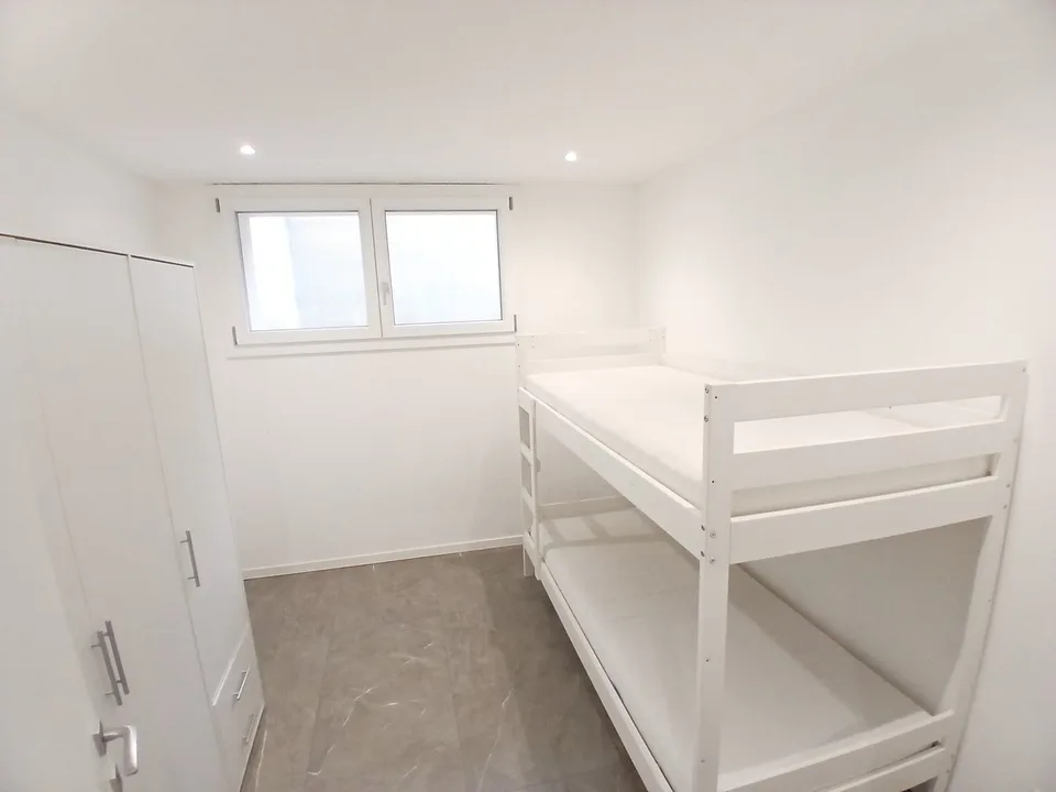Modern and Bright 3.5-Room Apartment with Private Garden in Rivera