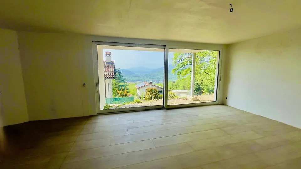 ESCLUSIVO E SPAZIOSO 4.5 LOCALI CON GIARDINO IN CAPRIASCA