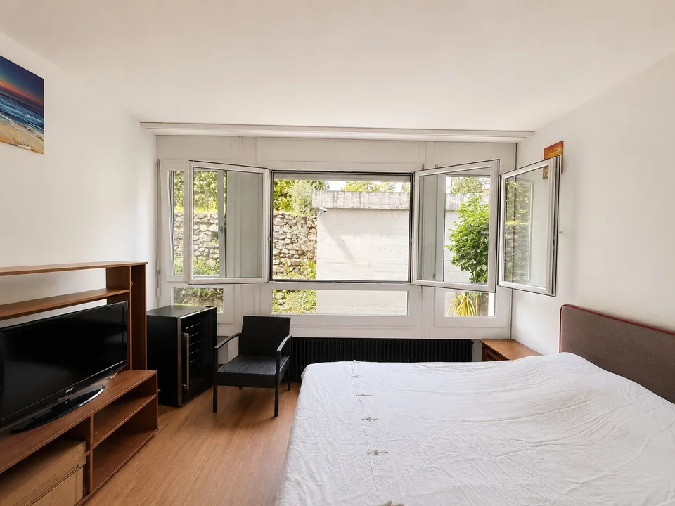 GROSSE 3.5 ZIMMER WOHNEINHEIT MIT GROßEM PRIVATGARTEN IN LUGANO BESSO