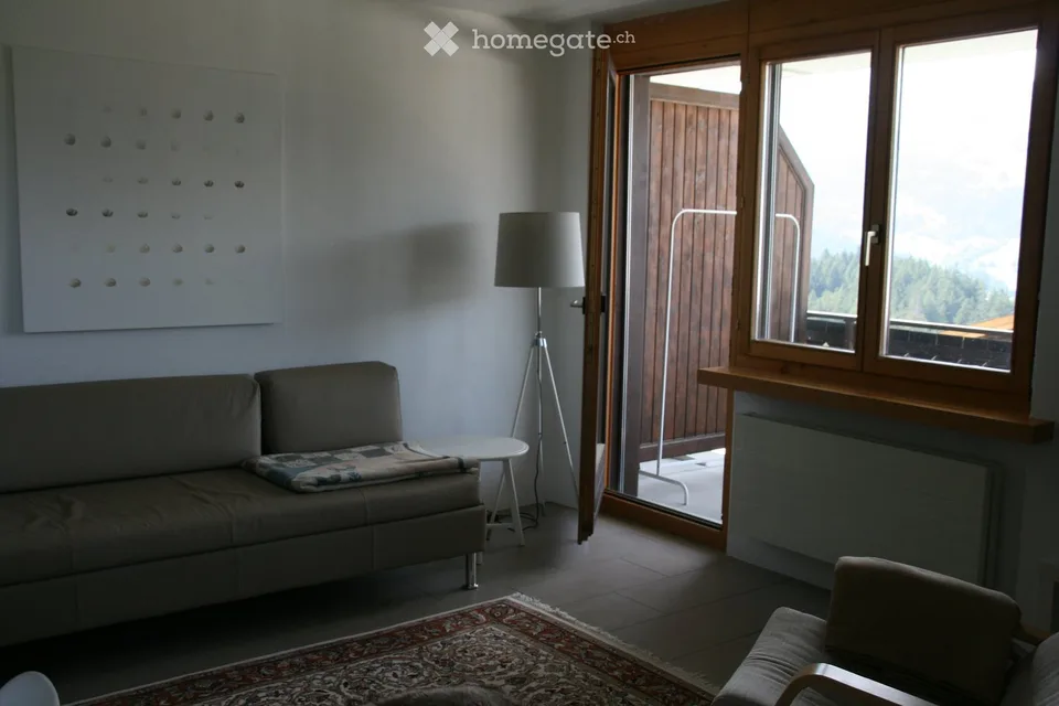 Situato direttamente sulla pista, affascinante appartamento di 1,5 locali con vista sulla montagna