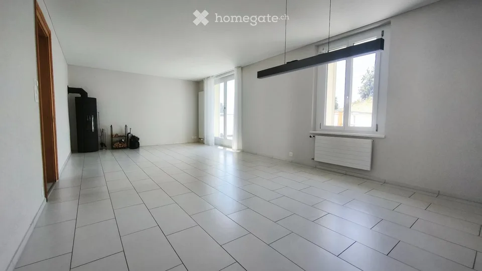 5.5 Zimmer-Wohnung mit Balkon und Gartensitzplatz