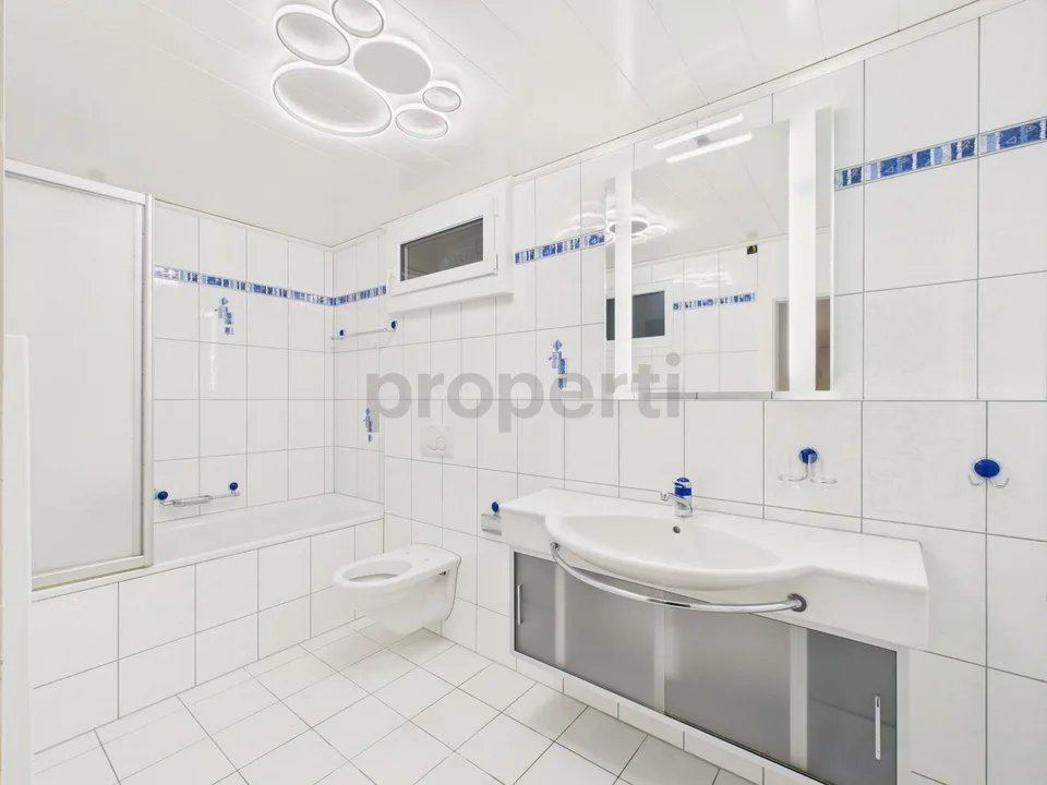 Modern 6.5-room renovated row house with garden in La Neuveville