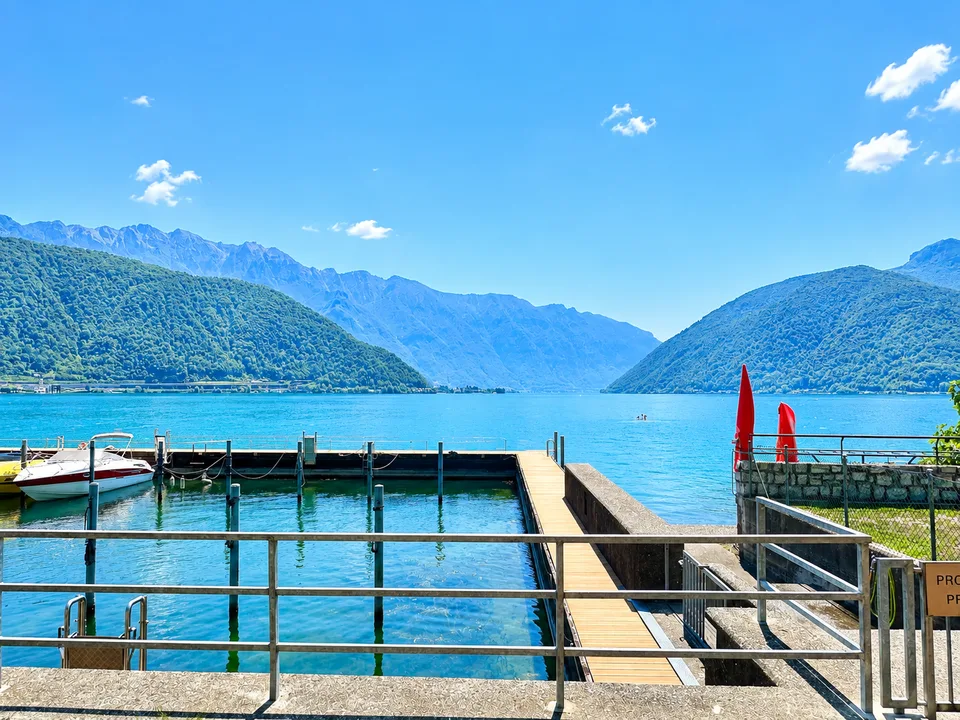 Penthouse de rêve sur le lac de Lugano avec terrasse et vue spectaculaire