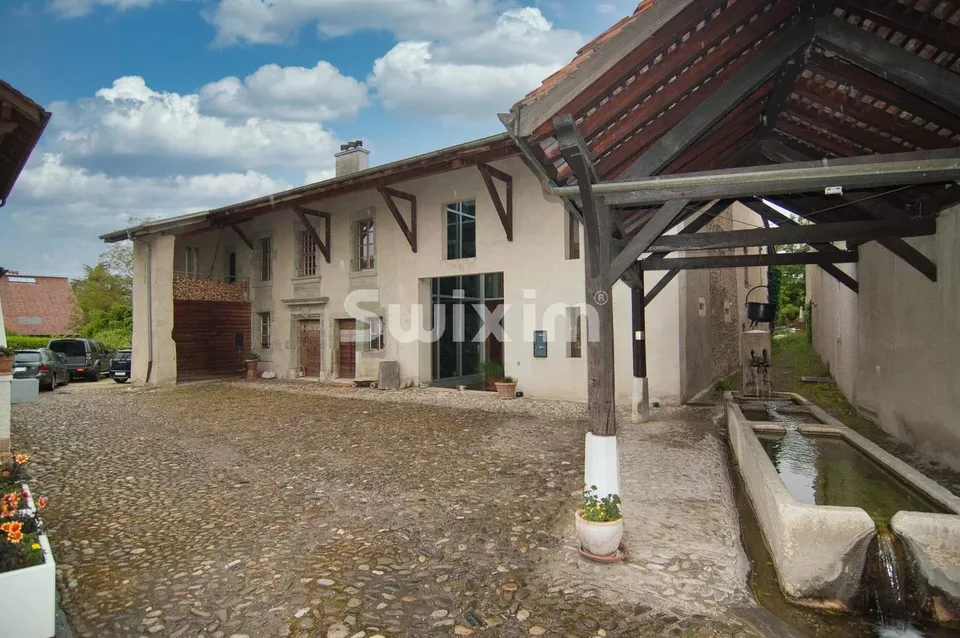 Au coeur du village maison historique