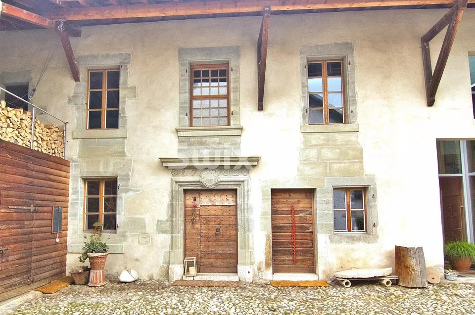 Au coeur du village maison historique