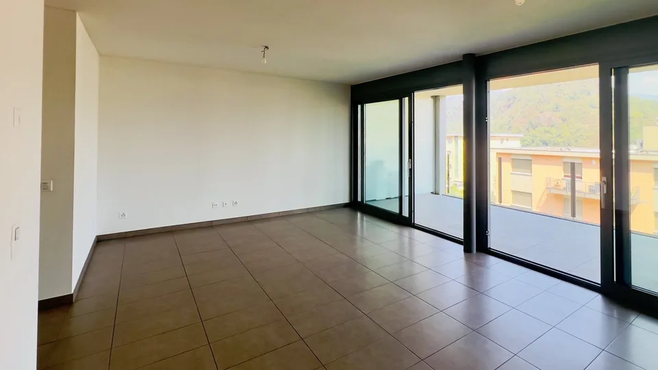 Appartement moderne et lumineux de 2,5 pièces avec grande terrasse à Gravesano