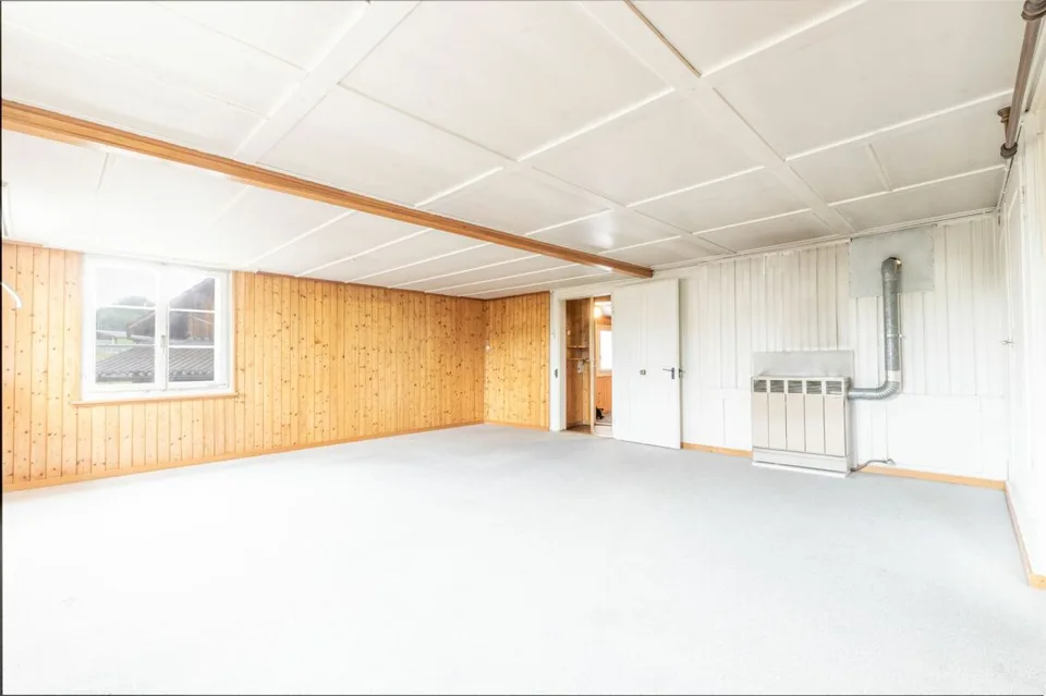Two-family house with outbuilding and versatile development potential
