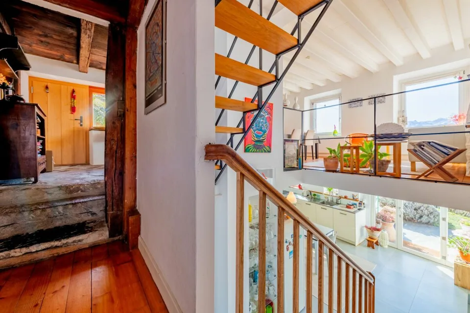 Renovated character house with panoramic views of the lake and the Alps