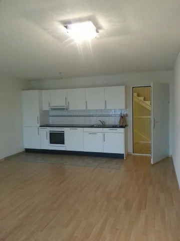Modern and spacious 1.5-room apartment on the ground floor with winter garden