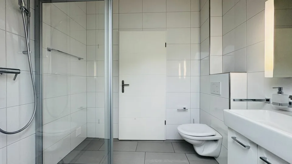 4.5-room maisonette with balcony, 2 wet cells, 2 underground parking spaces, laundry tower, and basement