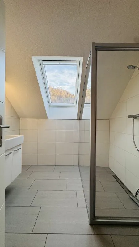4.5-room maisonette with balcony, 2 wet cells, 2 underground parking spaces, laundry tower, and basement