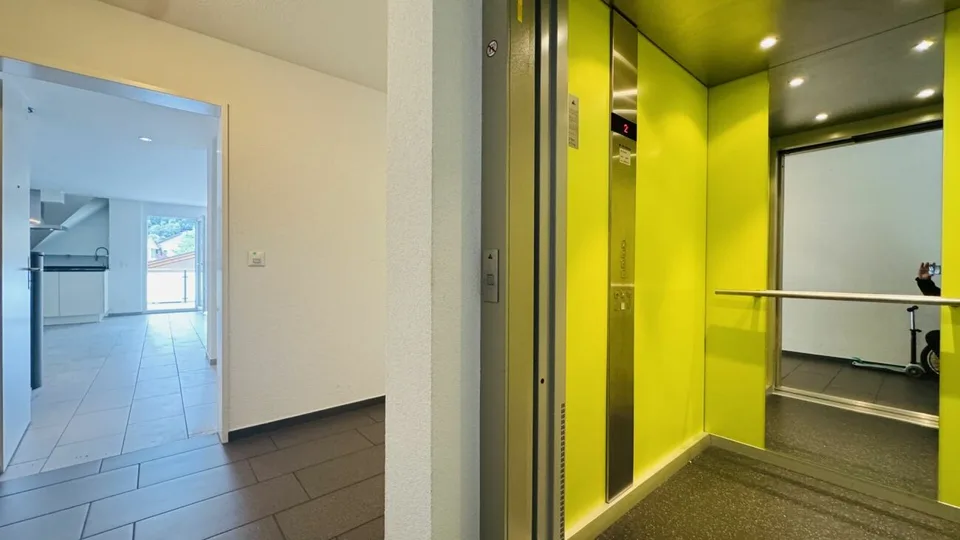 4.5-room maisonette with balcony, 2 wet cells, 2 underground parking spaces, laundry tower, and basement