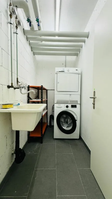 4.5-room maisonette with balcony, 2 wet cells, 2 underground parking spaces, laundry tower, and basement
