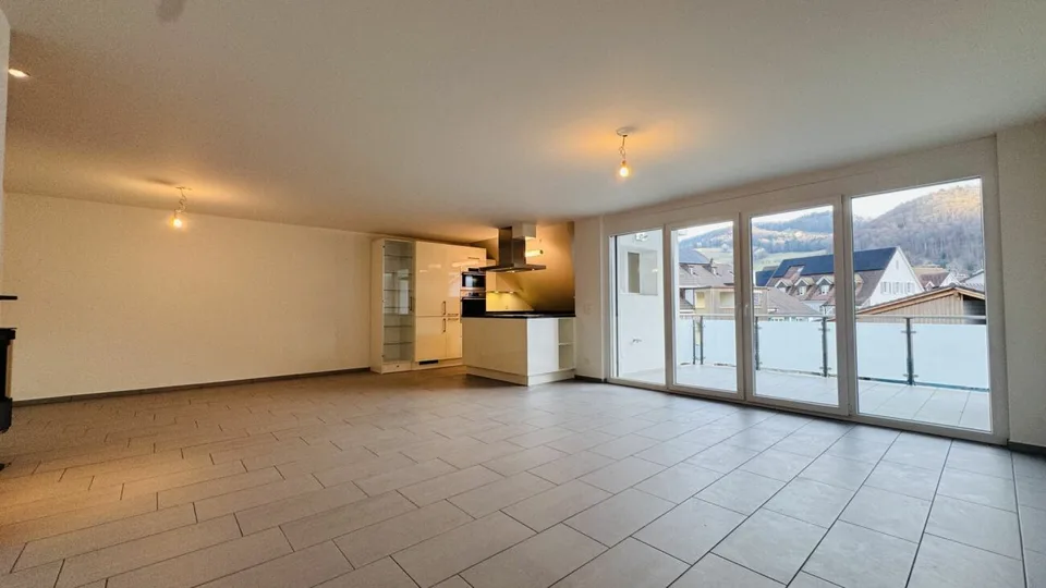 4.5-room maisonette with balcony, 2 wet cells, 2 underground parking spaces, laundry tower, and basement