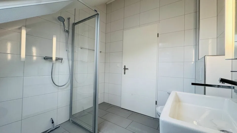 4.5-room maisonette with balcony, 2 wet cells, 2 underground parking spaces, laundry tower, and basement