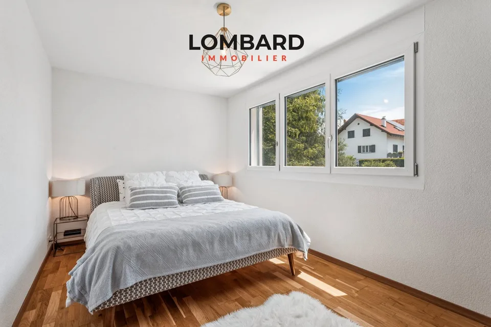 Exceptional 4.5-room apartment with private plot