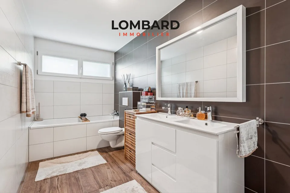 Exceptional 4.5-room apartment with private plot