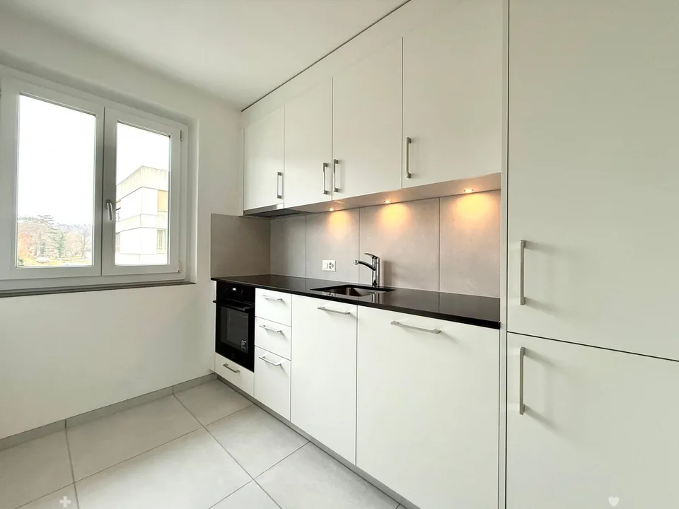 Appartement 2,5 pièces rénové de haut standing avec balcon dans le quartier de Mühlefeld