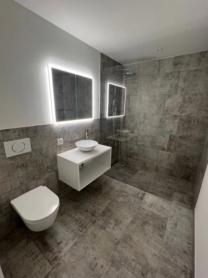 Exklusive Neubauwohnung im Erdgeschoss mit Garten - an erhöhter Lage in Witikon